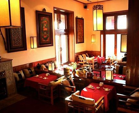 Mgallery Resort Hotel شانغريلا المطعم الصورة